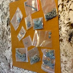 2for12$Cute silver coloured jewelry making charms.